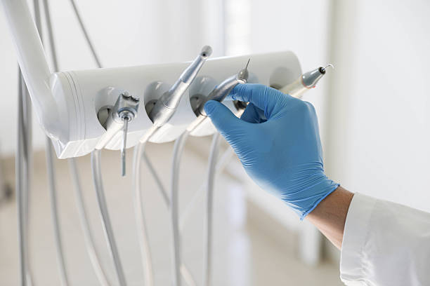 Professional Tooth Extraction technician working in Winterville, NC